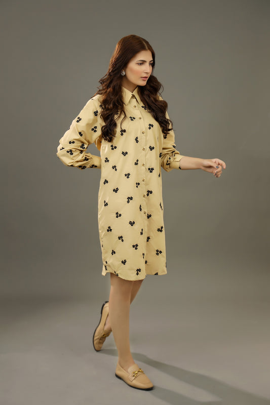 Woman wearing a beige dress with black floral pattern on a gray background Premium-organic-cotton-summer-woman-top-floral--embroidery-fullsleeve-shirtdress-sideview